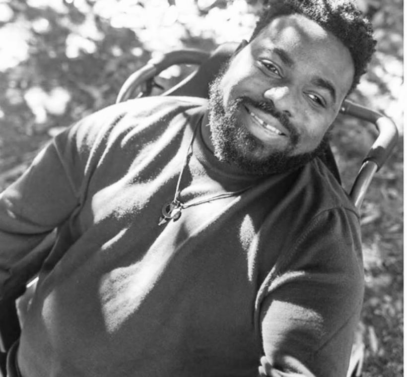 a black and white photo of Ajani " AJ " Murray